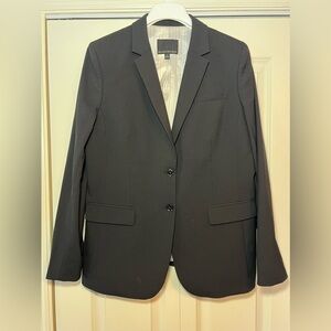 Banana Republic Women’s two-button black blazer. Fully lined. Wool blend. Sz 14.